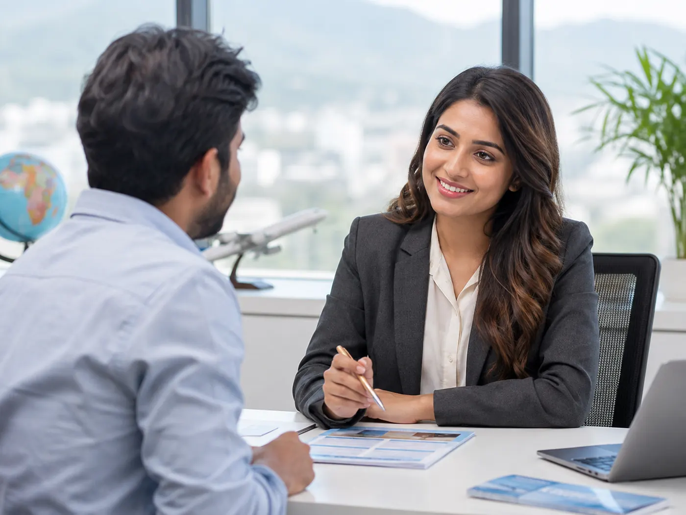Visa consultant discussing travel plans with a client